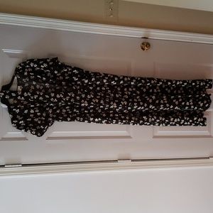 Black daisy short sleeve button up jump suit